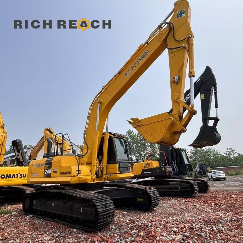 Rear view of a 2018 Komatsu PC240LC excavator, listed for $34,722
